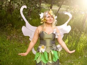 Generic Green Fairy with her delicate white wings before a Calgary children's event to celebrate the changing of the seasons.