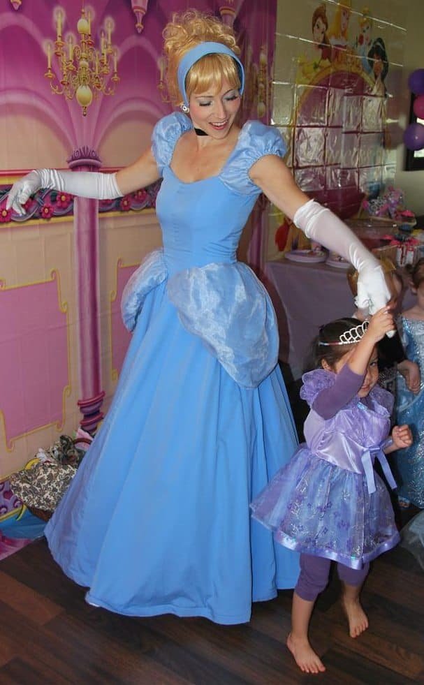 Princess Cinderella dancing with little princess at the Calgary ball