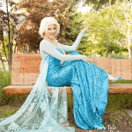 The Ice Queen sitting on a Calgary park bench