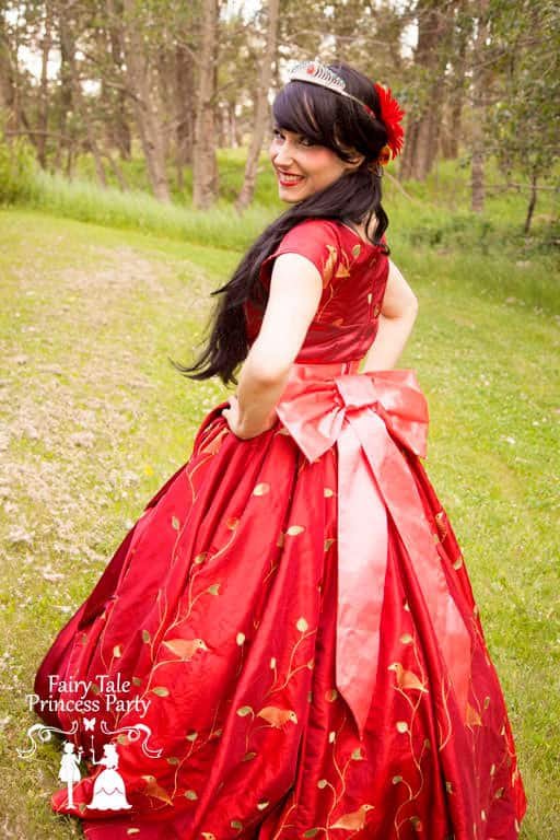 Latina Princess showing off her gown's pink bow