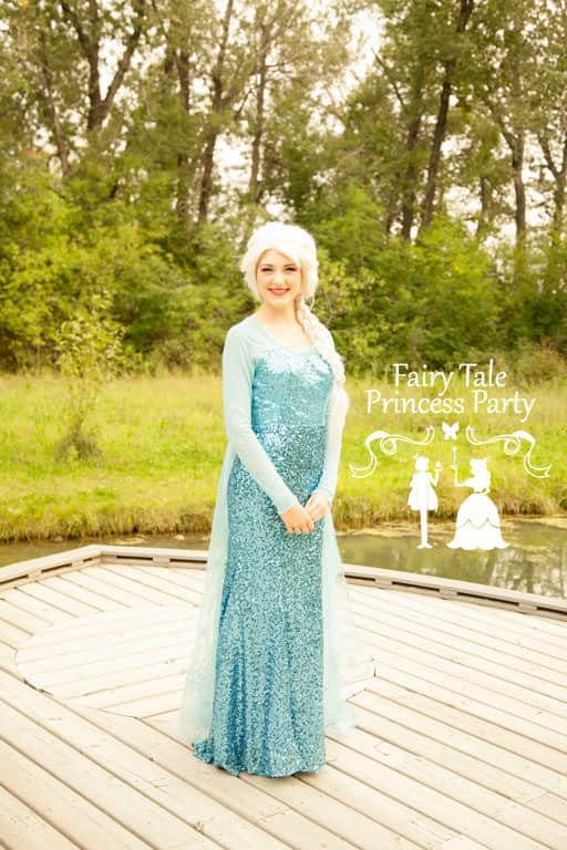 Being careful not to freeze kids at any character parties in Calgary, the Ice Queen waits on a dock