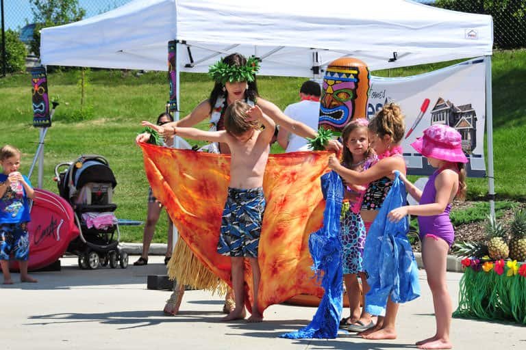 This Calgary hula dancer will teach all of the kids how to tie on a pareo.